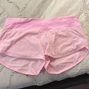 Lulu lemon light pink shorts, barely worn great condition, size 4